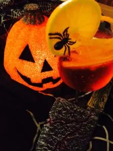 Halloween cocktail with champagne
